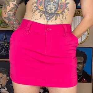Under Armour pink mini skirt